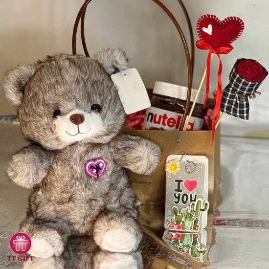 تصویر  پکیج شکلات و عروسک خرس قلب چراغدار 2